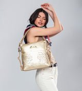 Nature Pachamama convertible golden bag into a rucksack